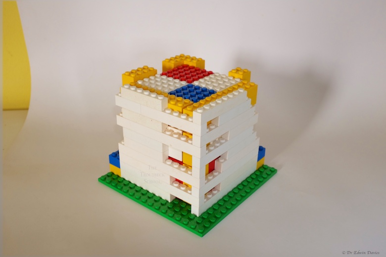 lego trinomial cube holder with hinged, removable gate