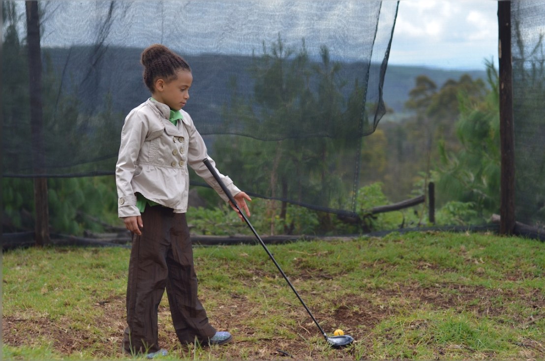 Our resident young pro golfer tees up