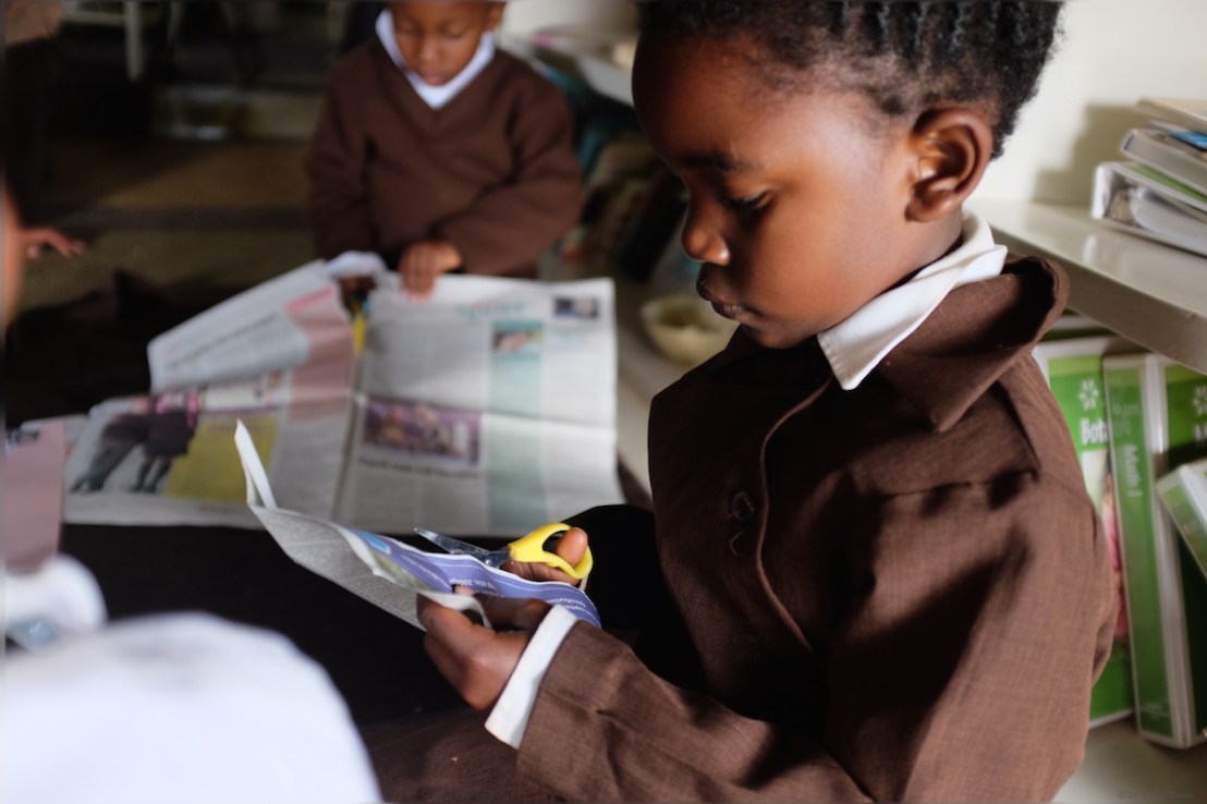 Concentrating on cutting using the scissors 