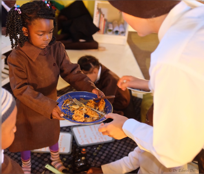 Presenting and sharing the pizza!